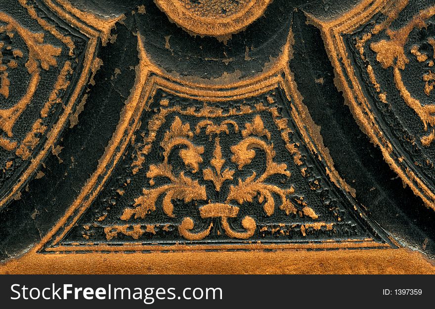 Detail of the leather cover of a Bible with gold lettering