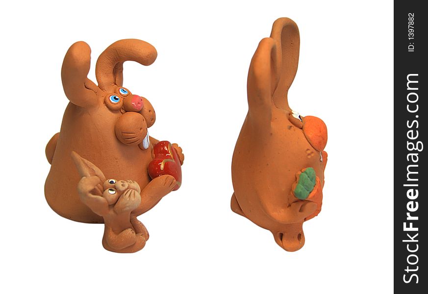 Happy rabbits family: father with carrot, mother wuth heart and fanny child. Happy rabbits family: father with carrot, mother wuth heart and fanny child