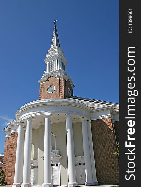 A Modern church with columns and steeple. A Modern church with columns and steeple