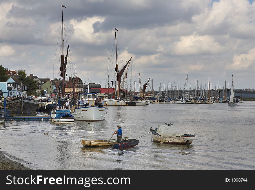 The River Blackwater is located in Maldon, Essex near the east coast of UK. Its populated in this area with old Thames Barges and swans. The River Blackwater is located in Maldon, Essex near the east coast of UK. Its populated in this area with old Thames Barges and swans.