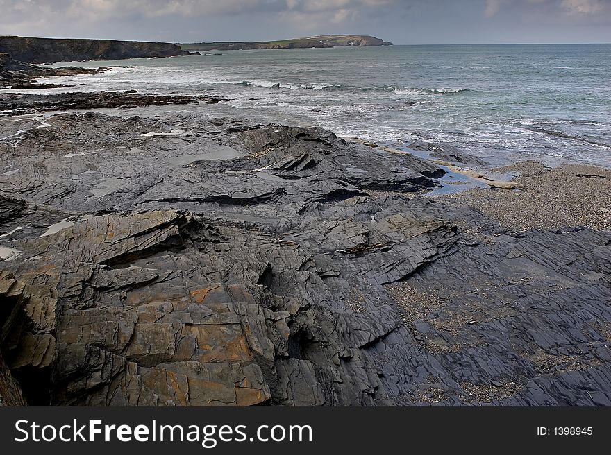 A rugged rocky bay on the north Cornwall coast in the UK. A rugged rocky bay on the north Cornwall coast in the UK.