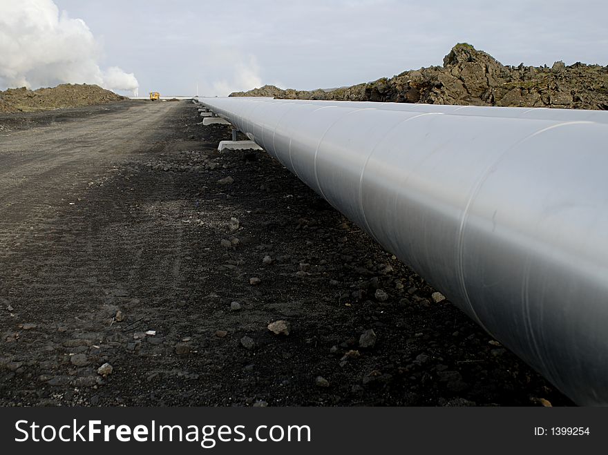 Pipes from heating plant in lava field in Iceland. Pipes from heating plant in lava field in Iceland.