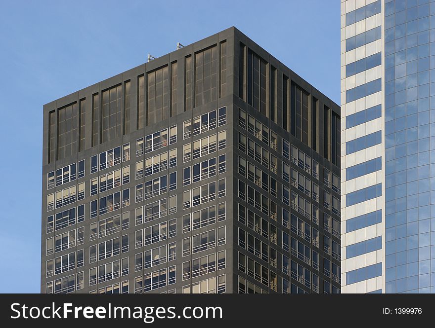 Horizontal view of business building on blue sky. Horizontal view of business building on blue sky