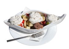 Dessert Of Ice Cream And Fruit In A White Boat. Royalty Free Stock Photography Dessert Of Ice Cream And Fruit In A White Boat. Royalty Free Stock Photography