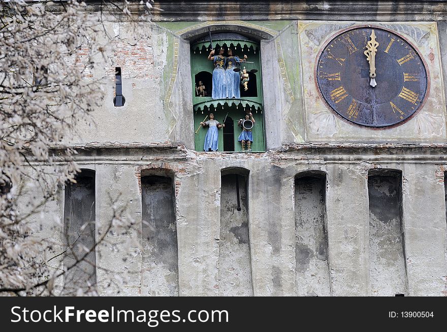 One vintage clock on medieval construction from city located in Romania Europe. One vintage clock on medieval construction from city located in Romania Europe