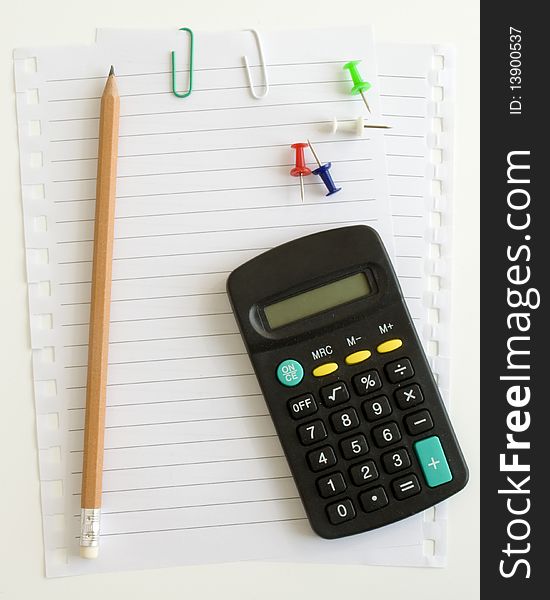 Calculator and pencil, paper clip button on a white background