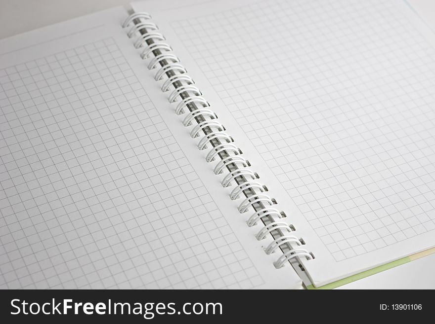 Open notebook with a spiral, a diagonal arrangement. Open notebook with a spiral, a diagonal arrangement