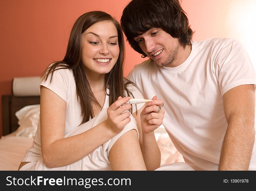 Boy And Nice Girl With Thermometer