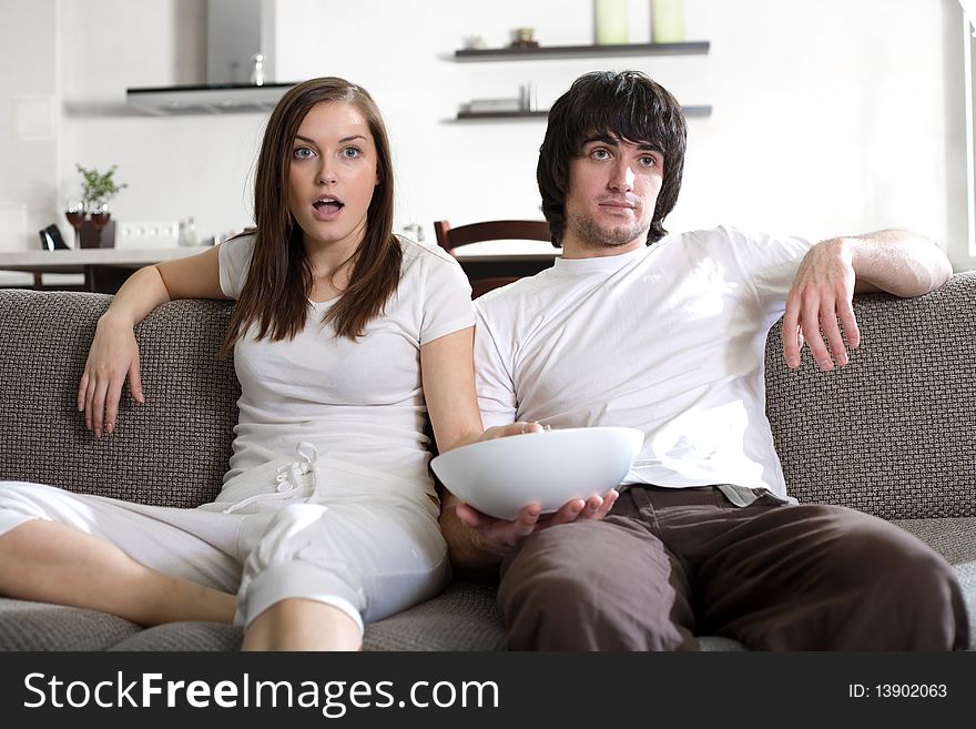 Boy with plate and girl with long hair