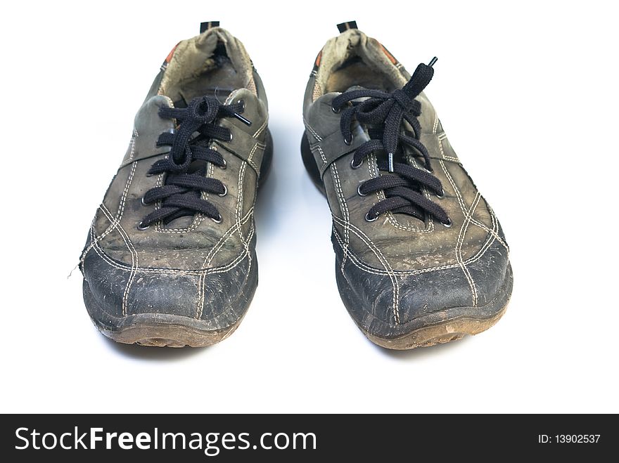 Old sports shoes. Isolated on white background.