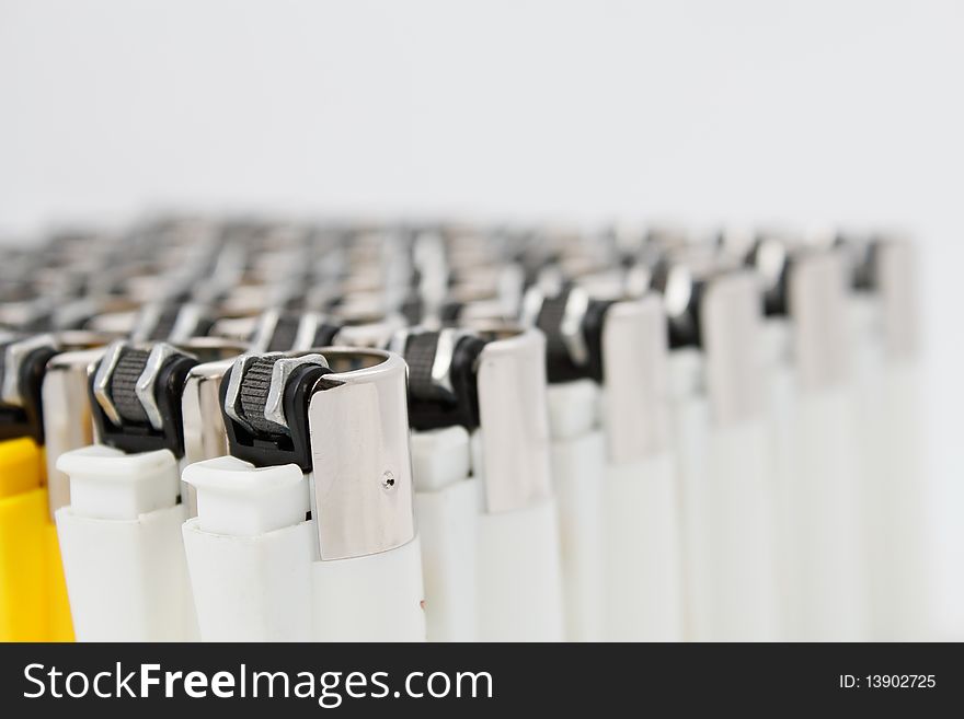 Plastic lighters array with shallow depth of field