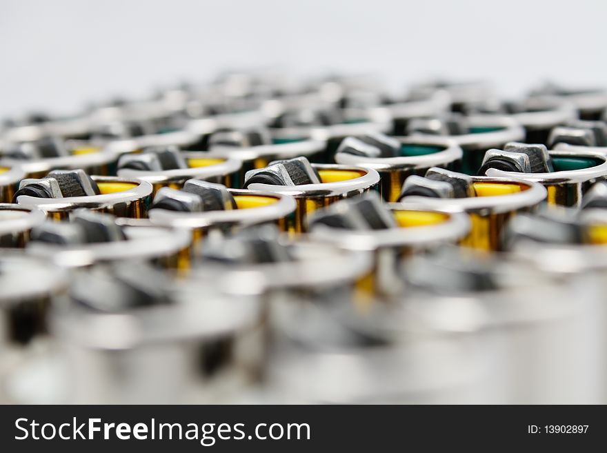 Plastic lighters array with shallow depth of field. Plastic lighters array with shallow depth of field