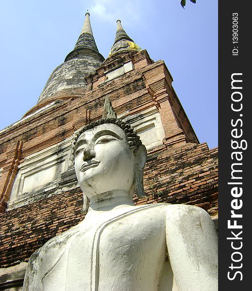Buddha and Ancient Pagoda in Ayutthaya, Thailand