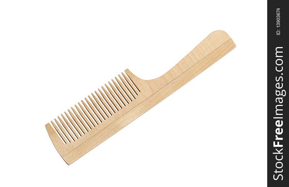 Wooden comb isolated on white background with clipping path