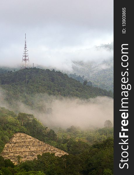 A communication tower on top of a hill taken during paying respect to ancestor.