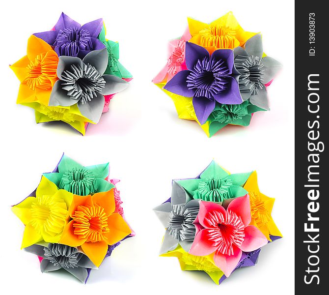 Colorfull origami kusudama from rainbow flowers isolated on white. View from four angles. Colorfull origami kusudama from rainbow flowers isolated on white. View from four angles.