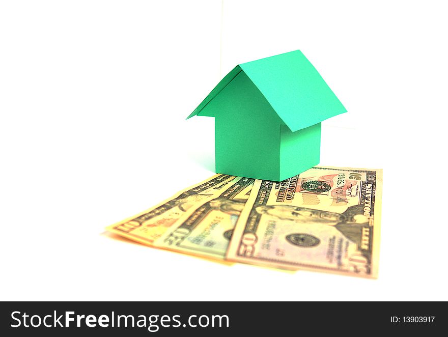 Green paper house isolated on white background. Green paper house isolated on white background