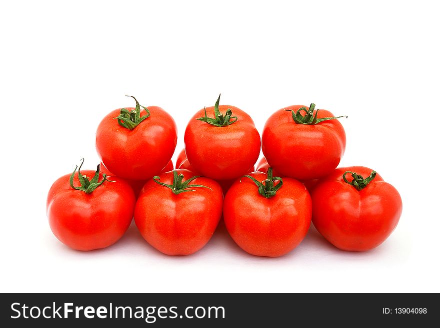 A few red tomatoes isolated on white