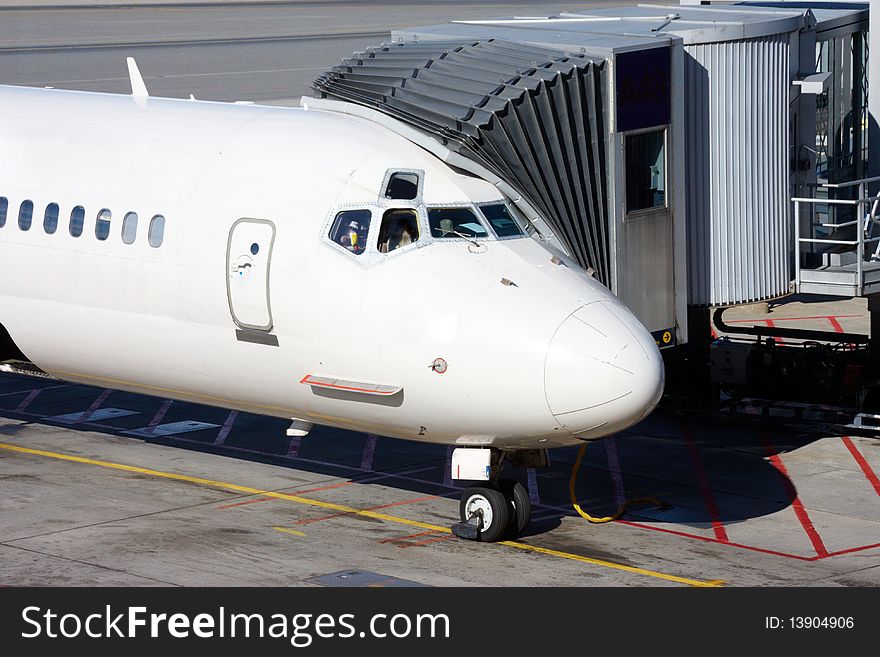 Airplane near a terminal ready to load