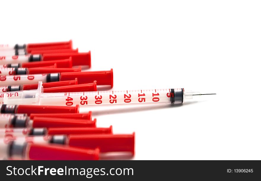 Insulin syringes, isolated on the white background