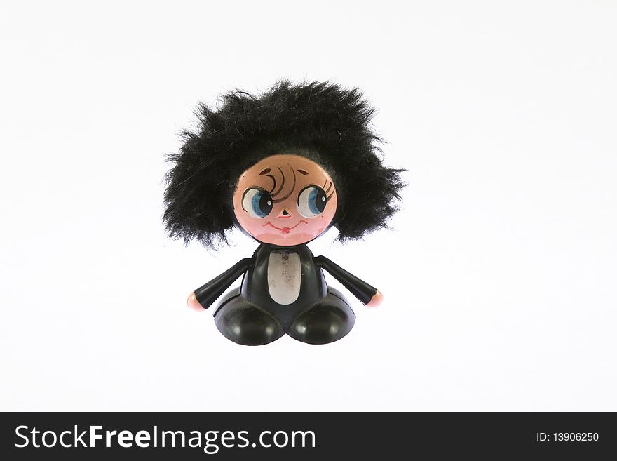 Cheburashka toy with big black ears isolated on white