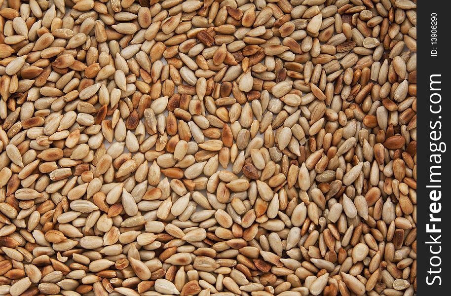 Fried sunflower seeds background texture