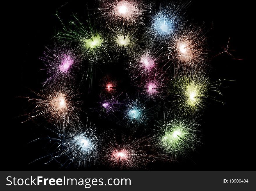 Color sparkler spiral isolated on black background