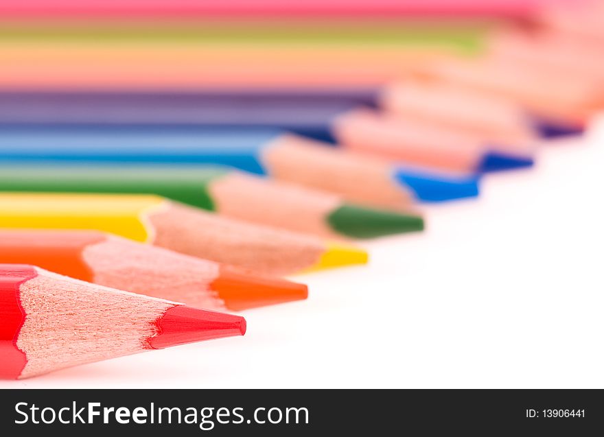 Close-up image of multicolor pencils isolated on white background