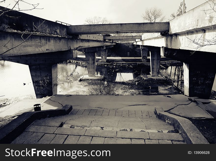 Picture with a ruined concrete bridge. Picture with a ruined concrete bridge