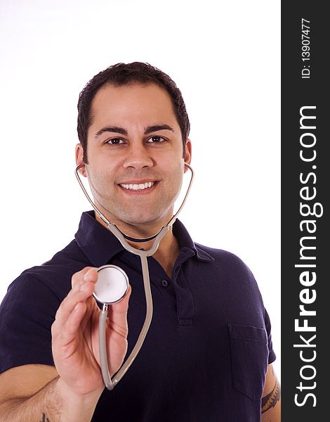 Young Hispanic male doctor holding his stethoscope. Young Hispanic male doctor holding his stethoscope