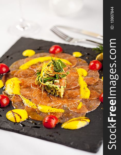 Salmon Carpaccio on Black Dish