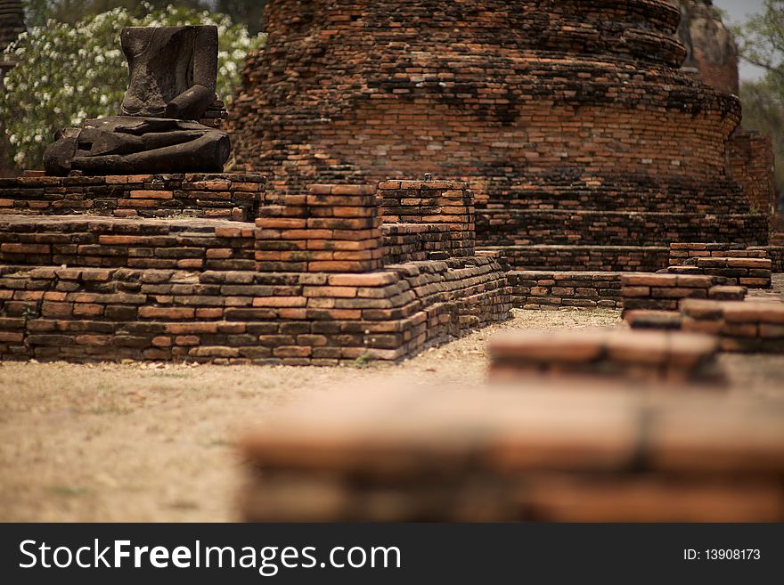 Alone the sitting buddha in the wreck of the ancient temple. Alone the sitting buddha in the wreck of the ancient temple.