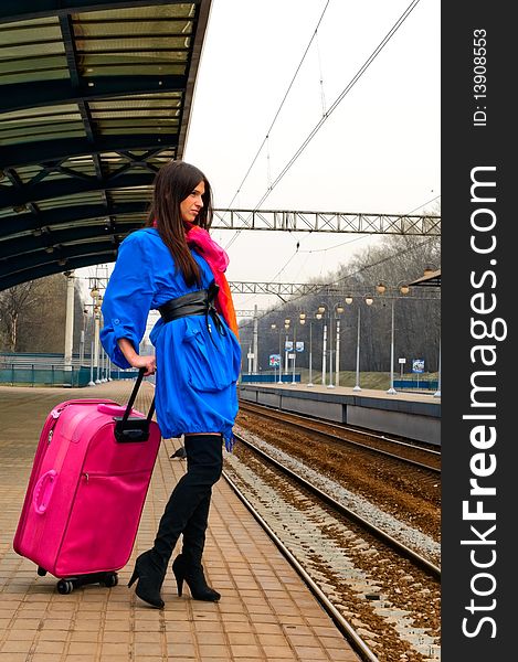 Woman With Pink Suitcase