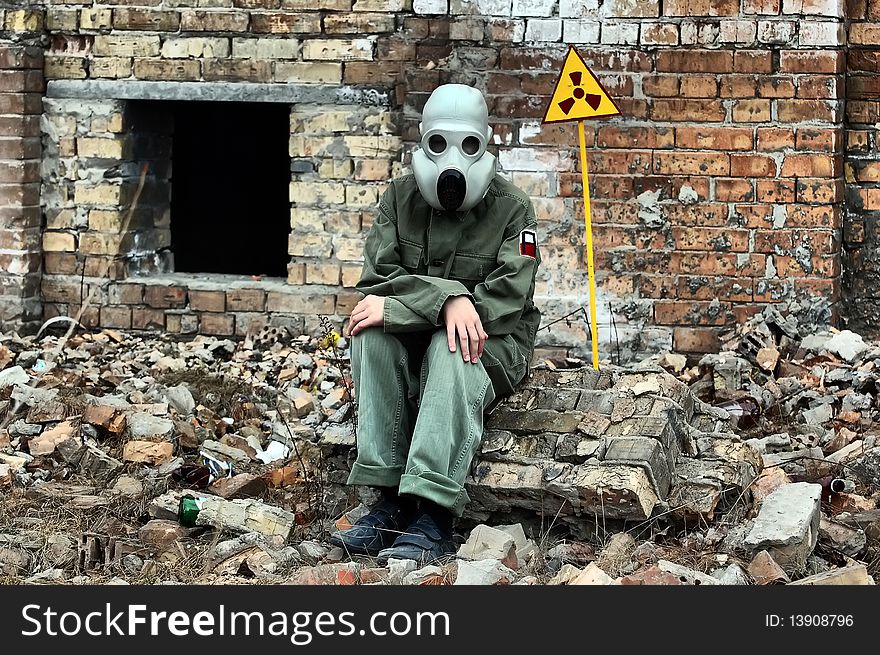 Teenager weared American military uniform.Lost city. Near Chernobyl area. Modern ruins. Ukraine. Kiev region. Teenager weared American military uniform.Lost city. Near Chernobyl area. Modern ruins. Ukraine. Kiev region