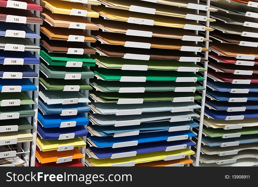 Multi set of a colored papers in shop. Multi set of a colored papers in shop