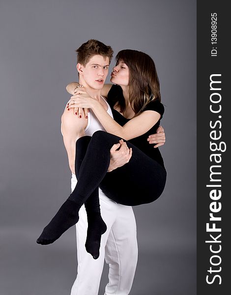 Funny couple posing in studio