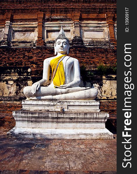 Buddha statues at the temple of Wat Yai Chai Mongkol in Ayutthaya near Bangkok, Thailand. Buddha statues at the temple of Wat Yai Chai Mongkol in Ayutthaya near Bangkok, Thailand