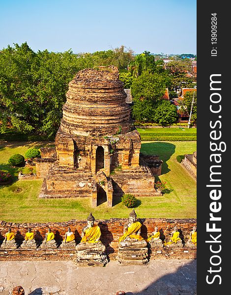 Buddha statues at the temple of Wat Yai Chai Mongkol in Ayutthaya near Bangkok, Thailand. Buddha statues at the temple of Wat Yai Chai Mongkol in Ayutthaya near Bangkok, Thailand