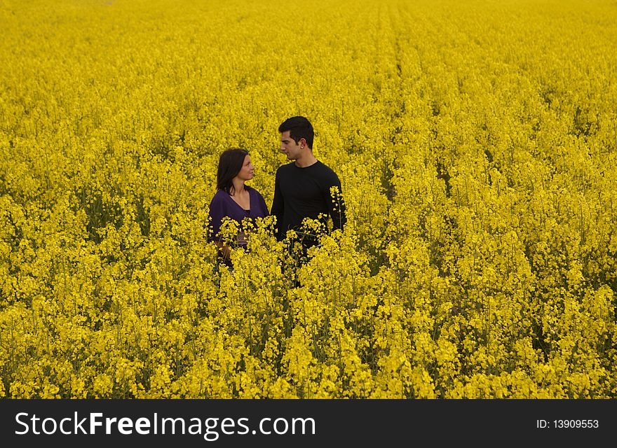 Young Couple in the Rape Field