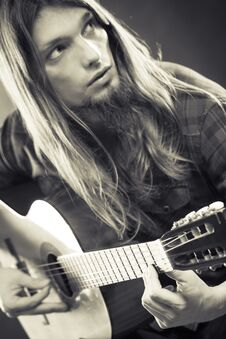 Guitarist Is Playing The Guitar Royalty Free Stock Images