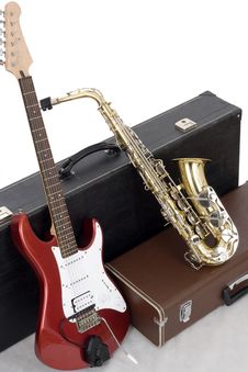 Red Electric Guitar And Gold Sax Stock Photos Red Electric Guitar And Gold Sax Stock Photos