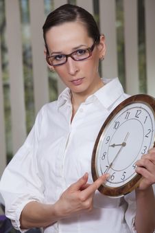 Unhappy Woman With Big Clock Stock Images Unhappy Woman With Big Clock Stock Images