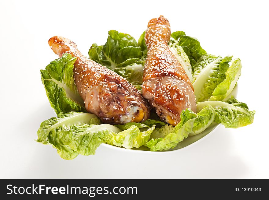 Caramelized chicken thighs with sesame and lettuce