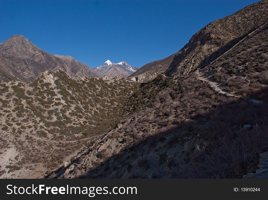 View of Syangang and Khatungkang peaks, after them will be Thorung La pass. View of Syangang and Khatungkang peaks, after them will be Thorung La pass