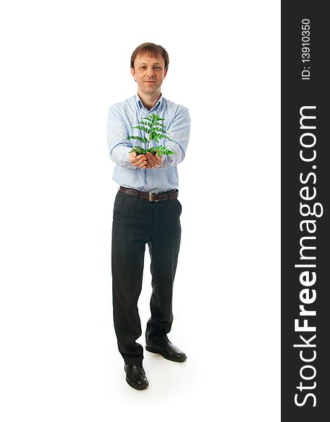 The Businessman With A Green Plant