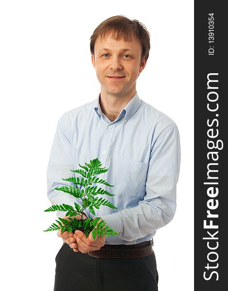 The businessman with a green plant isolated on a white background