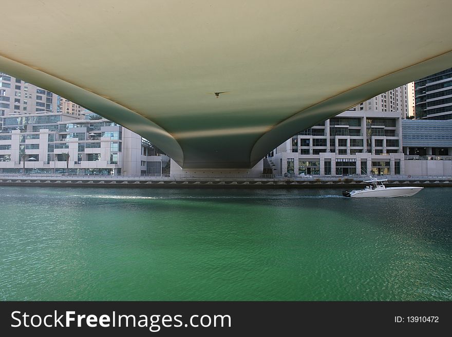 A view from under a bridge on the Marina Walk, Dubai Marina, Dubai. A view from under a bridge on the Marina Walk, Dubai Marina, Dubai.