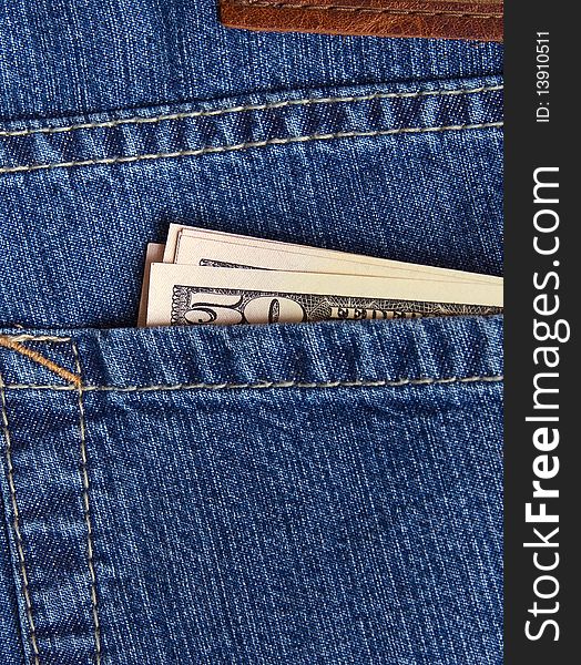 Dollars in casual jeans pocket. Dollars in casual jeans pocket