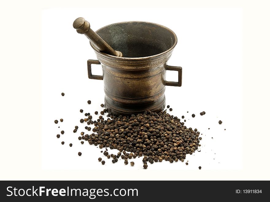 Copper mortar with pepper isolated
