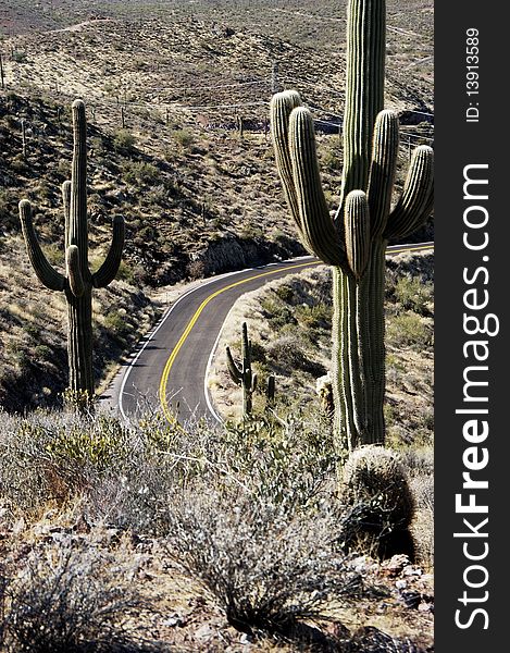 A winding road through the desert hills in Arizona. A winding road through the desert hills in Arizona.